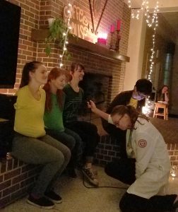 girls sing at coffeehouse