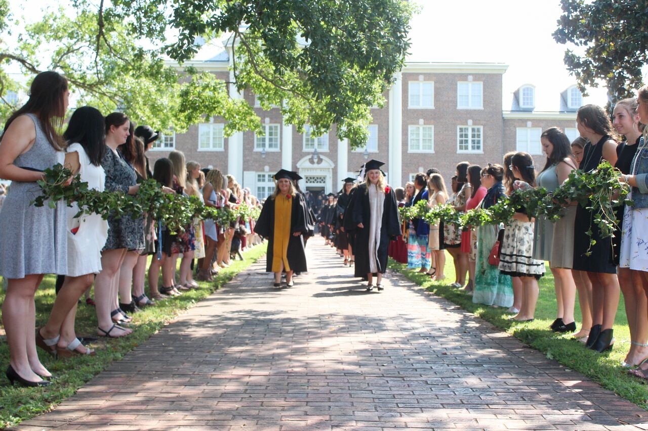 Underclassmen students hold the ivy chain as the senior class walks through. Photo by Mary Amelia Taylor.